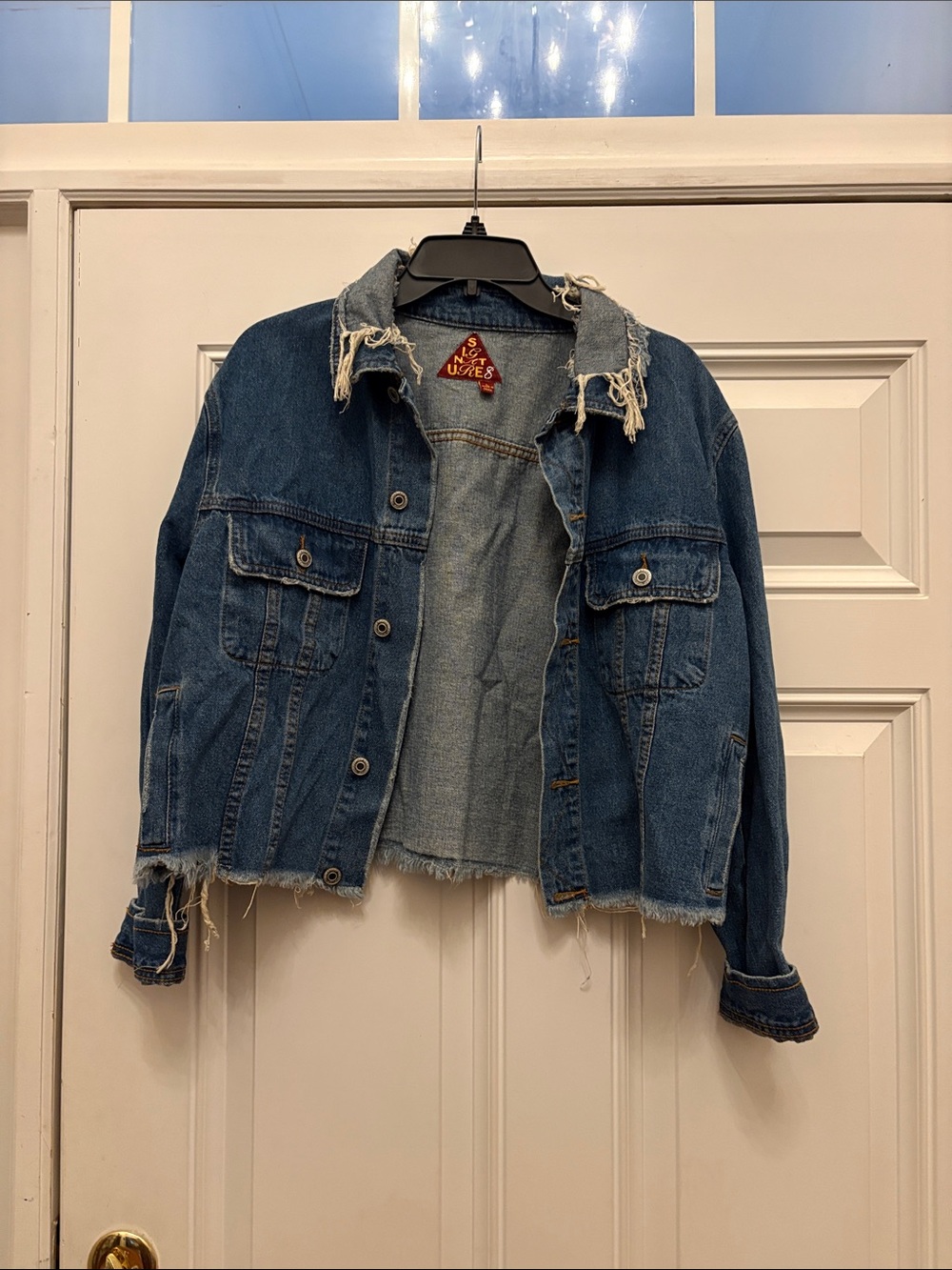 Women's Distressed Blue Denim Jacket with Frayed Collar